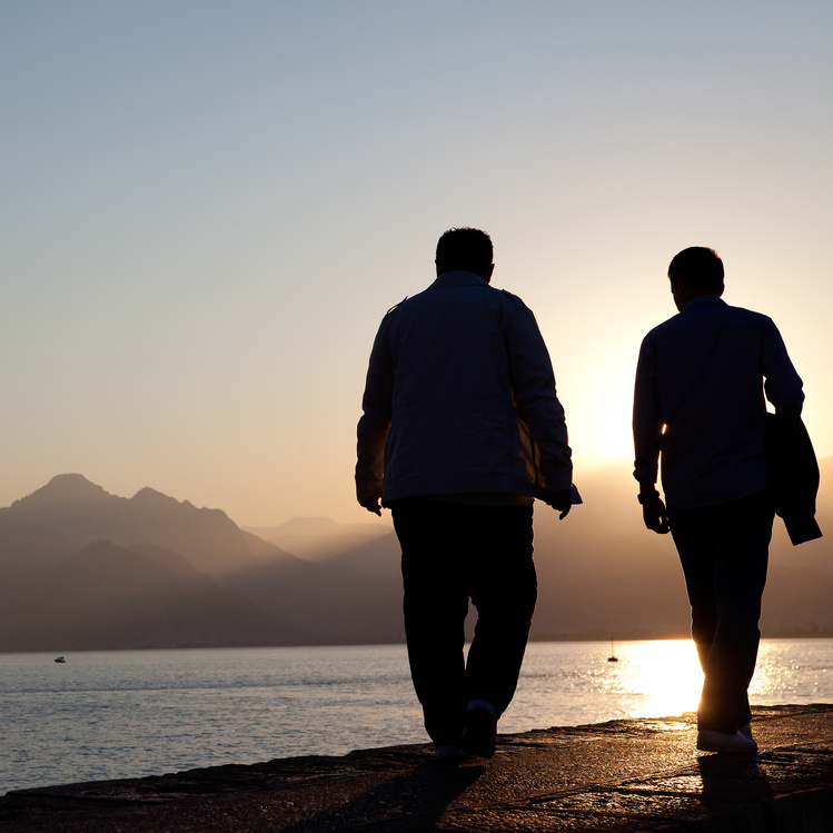 people walking, sunset.